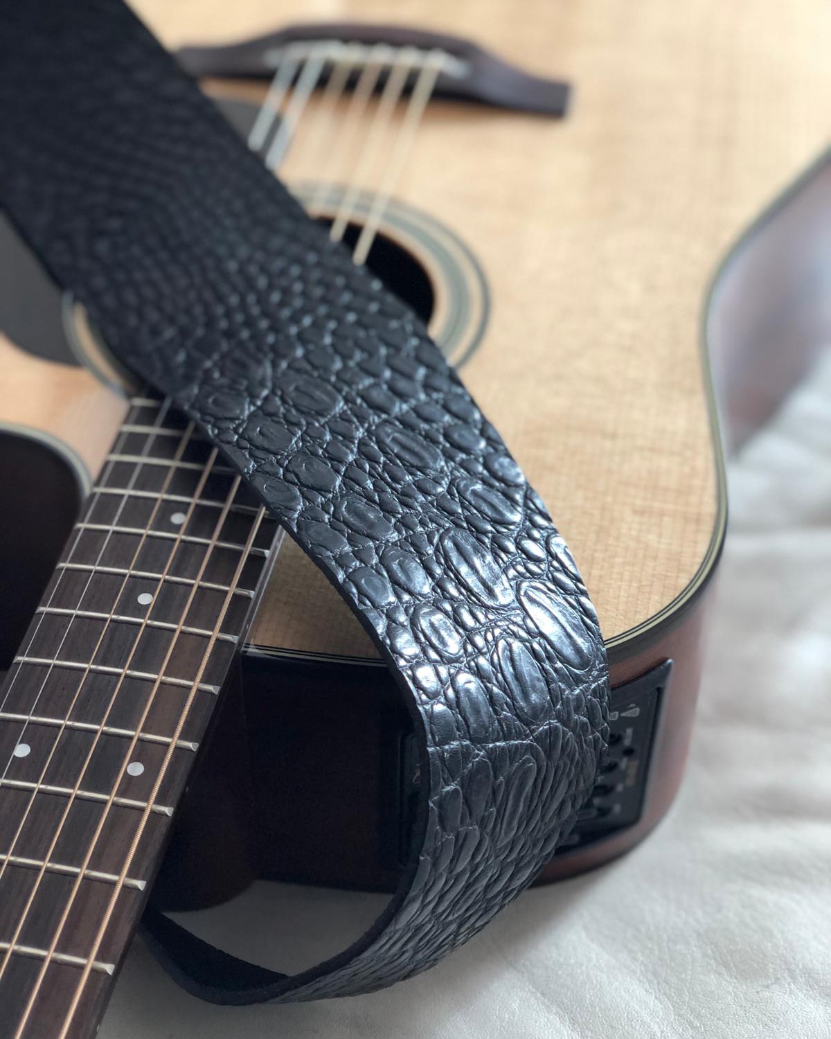 How to make the leather strap hole larger? - The Acoustic Guitar Forum
